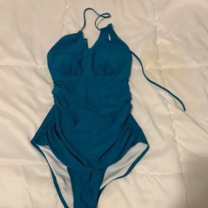 Never worn before one piece blue bathing suit